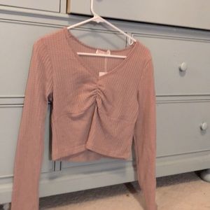 Long sleeved pink crop shirt
